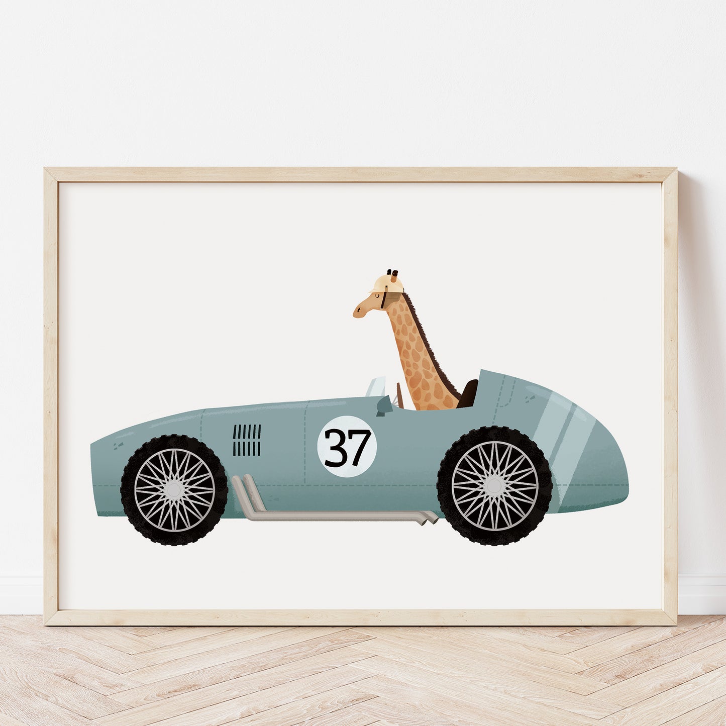 Giraffe on a vintage race car